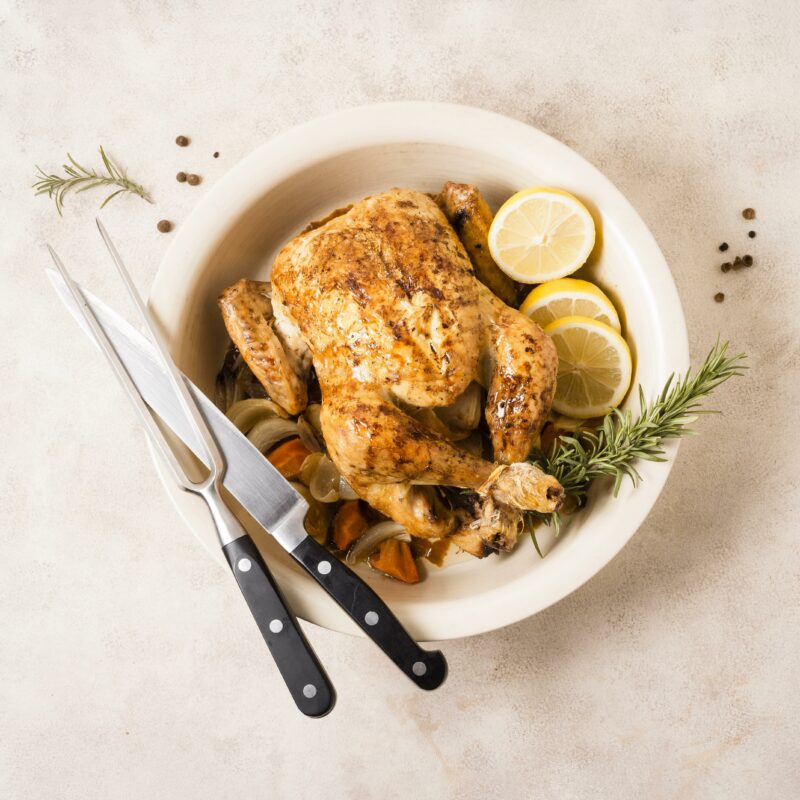 Cosori top view thanksgiving roasted chicken with lemon slices cutlery 2